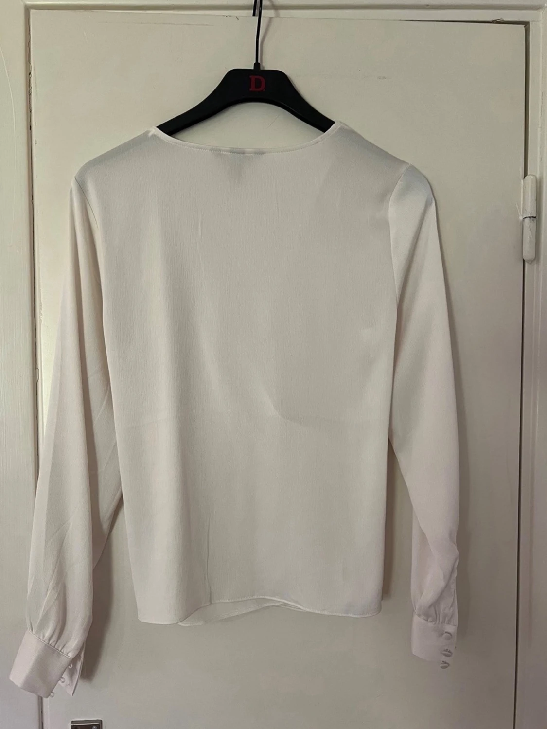 Vit blus med knappar - 1