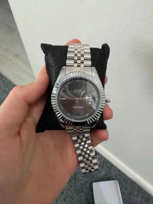 Rollie silver and black - As new.  big size, never made it smaller