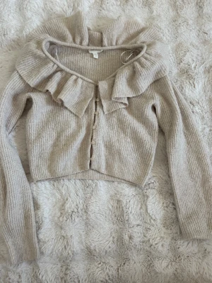 Stickad kofta - Passar xs/s!