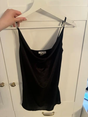 Black glitter top - Black glitter top in very good condition. S size Belle Amie brand.