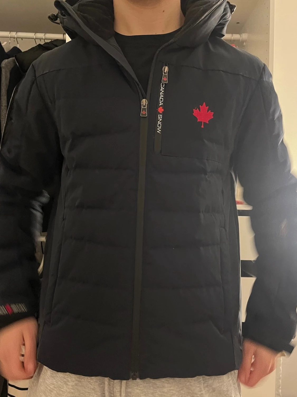 Svart dunjacka från Canada Snow