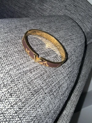 Brunt armband med guld - Jätte fint och knappt använt