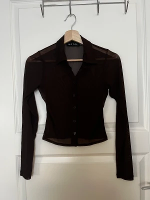 Meshskjorta  - Använd fåtal gånger. 