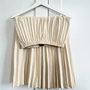 Beige kjol från Gina tricot i storlek 36🤍Använd en gång🫶🏼