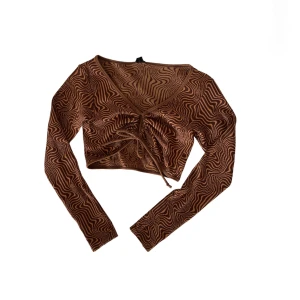 Urban outfitters tröja - Top från Urban Outfitters, aldrig använd och inga skador eller fläckar.