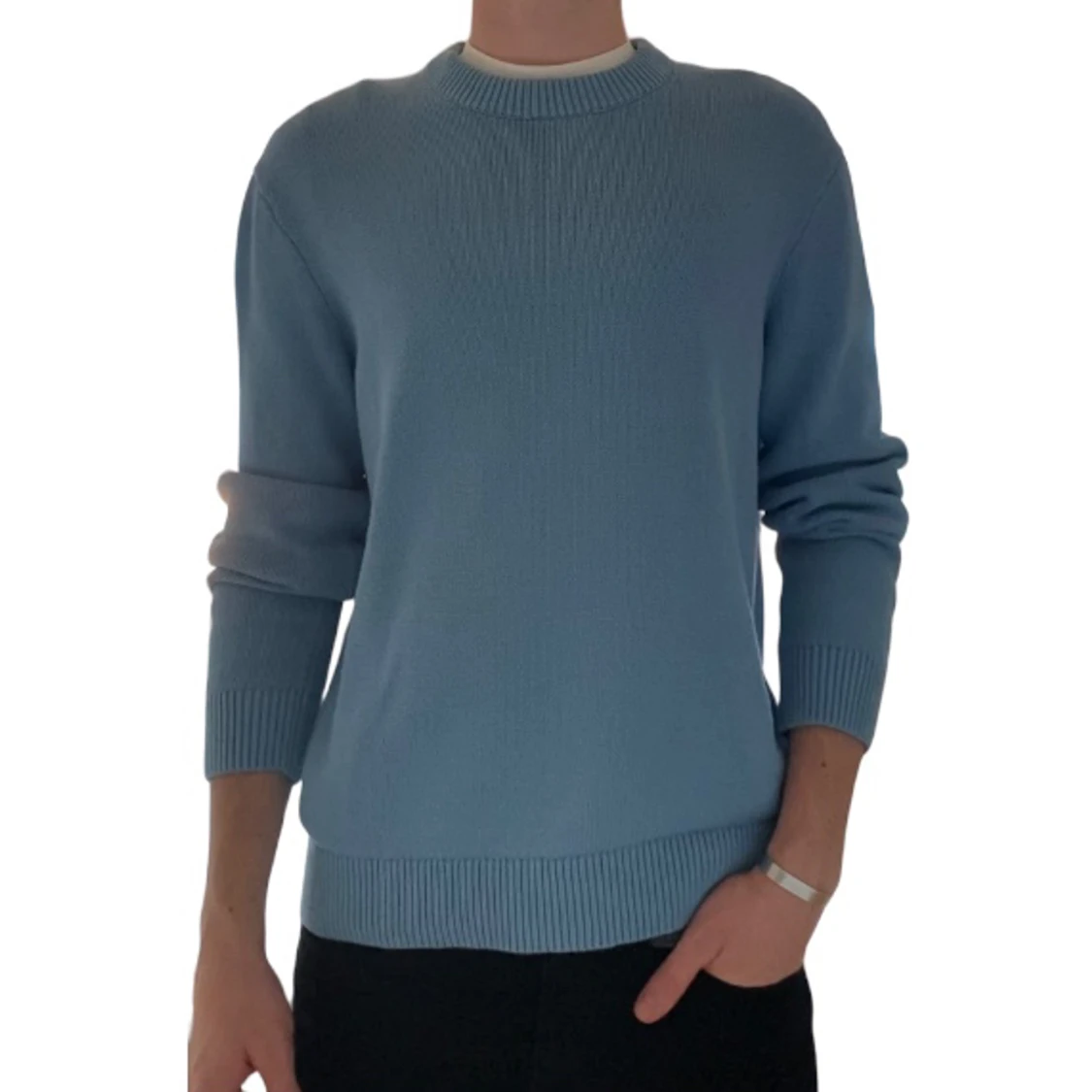 Stickad tröja ljusblå