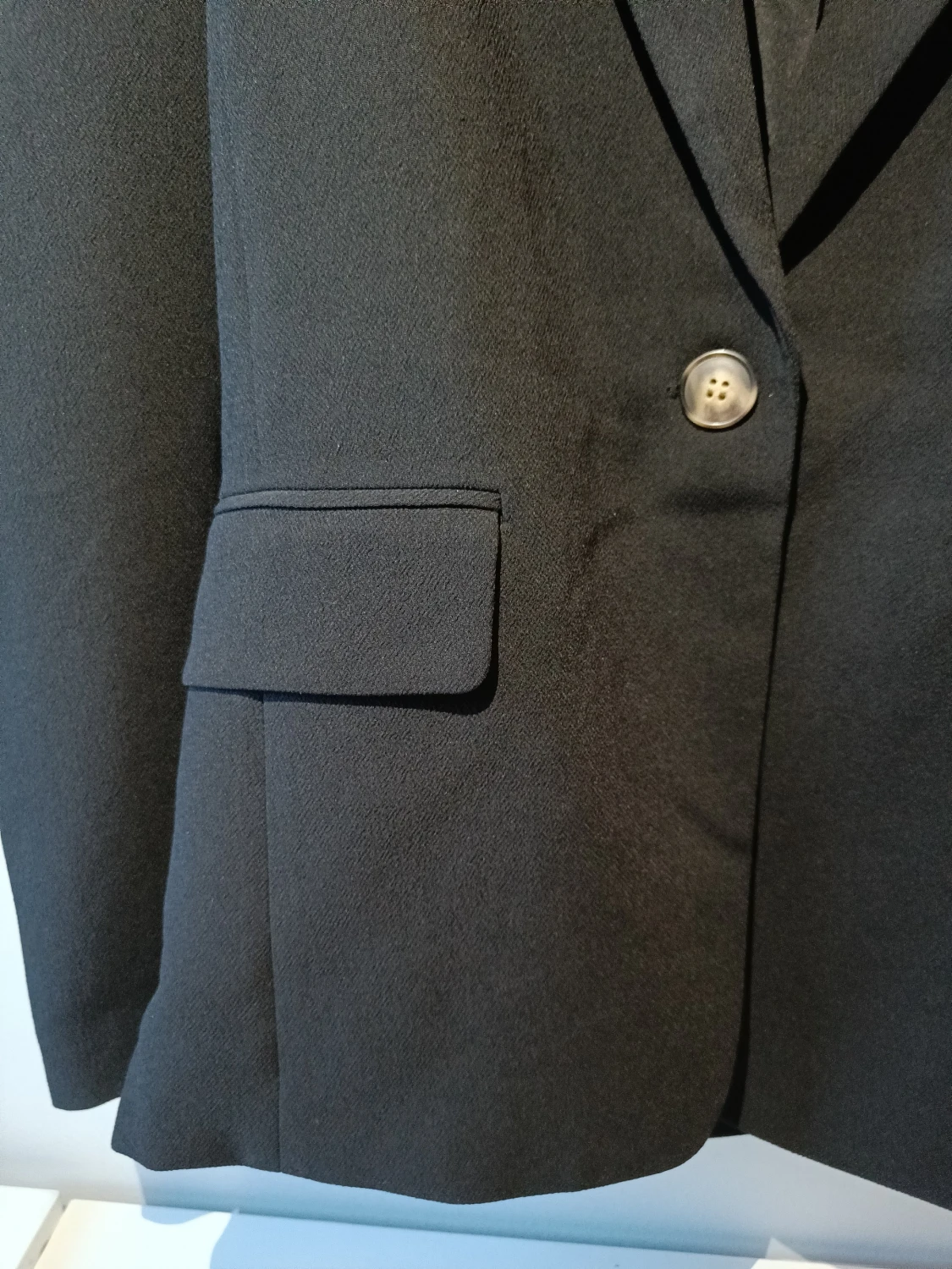 Svart kavaj i storlek 32 - 90