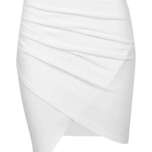 Vit kjol OANVÄND - Oanvänd. Passar xs/s