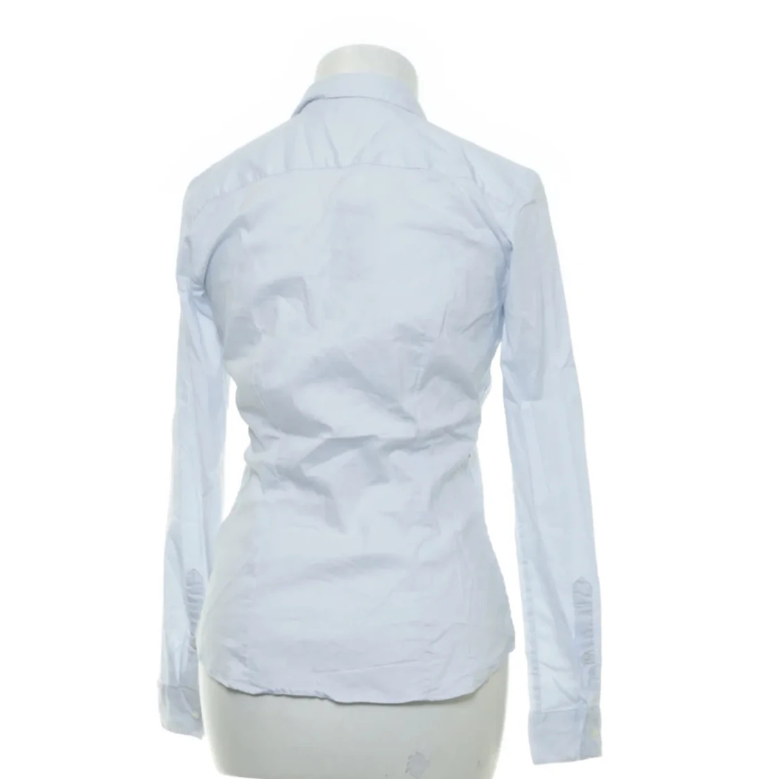 Ljusblå skjorta HM - 90