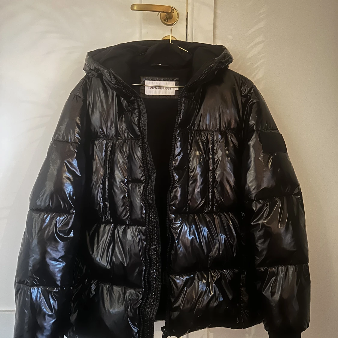 Calvin Klein glansig jacka