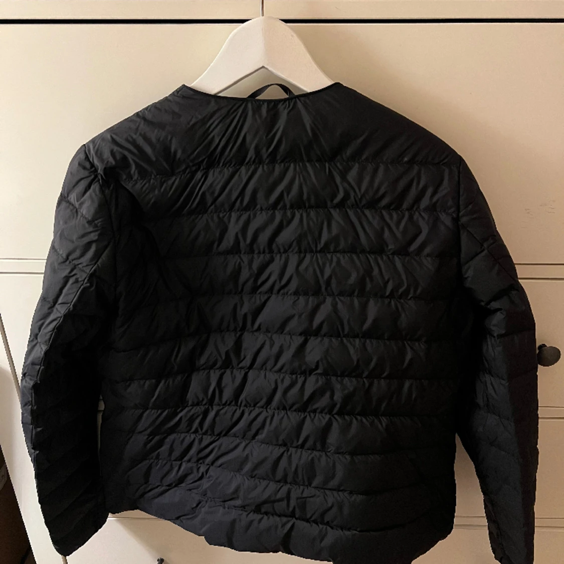 Svart dunjacka  - 91