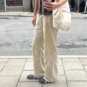 Vintage byxor - Vintage workwear byxor ned justerbar midja. 33 i längden