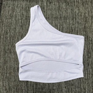 Söt topp - Strl xs.  Tyvärr alldeles för liten för mig därför ser det lite dumt ut på bilden men skulle varit supergulliga om den passa.  Använd gärna köp nu 