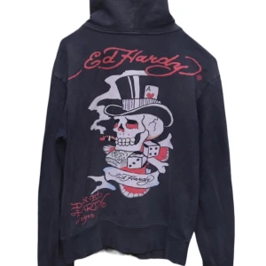 Ed Hardy Hoodie - Skriv vid intresse.  Mått:  pit to pit: 53cm Armlängd från armhåla: 52cm Total längd: 62cm Ganska sliten vid handlederna men går att sy om man inte gillar det.