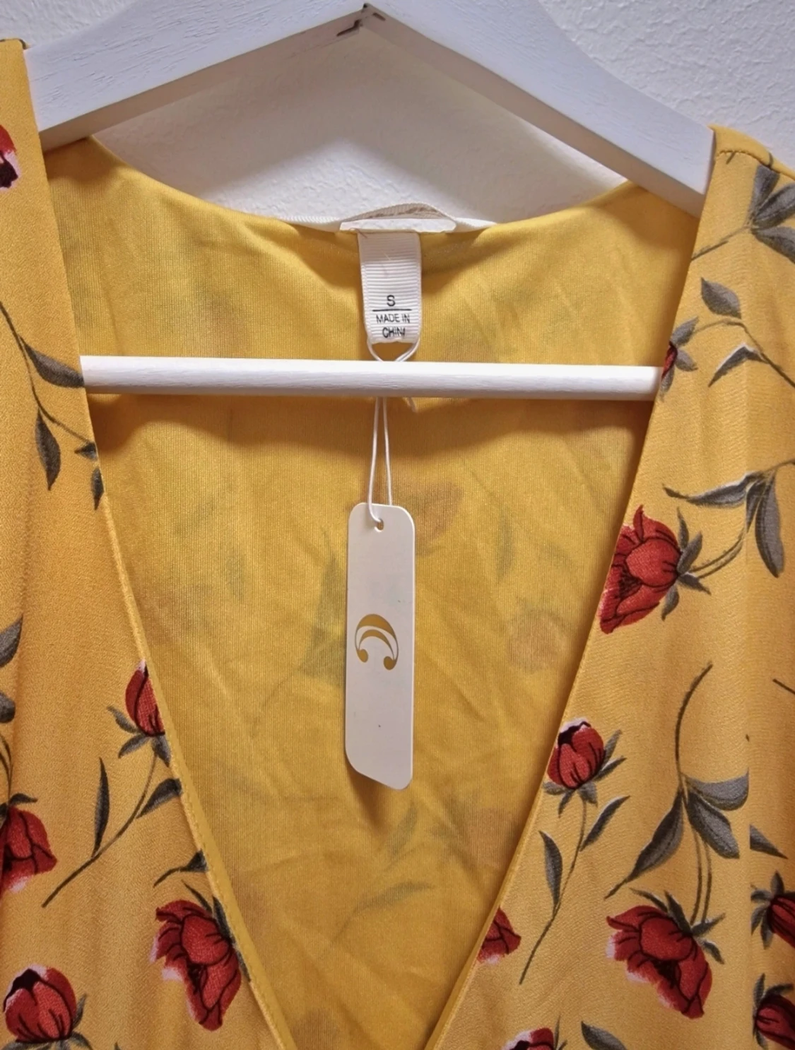 Blommig klänning S 36 - 90