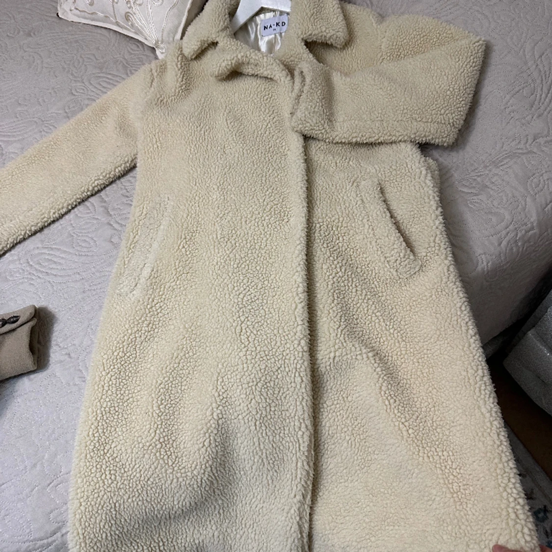 Beige teddyjacka