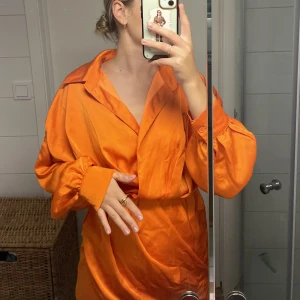 Orange klänning  - Klänning från Missguided i strl 34