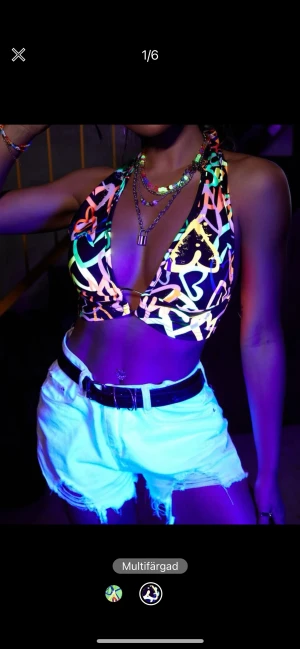 Neon Top  - Skiner i mörkret och mot lampor, väldigt snygg särskilt på fest!