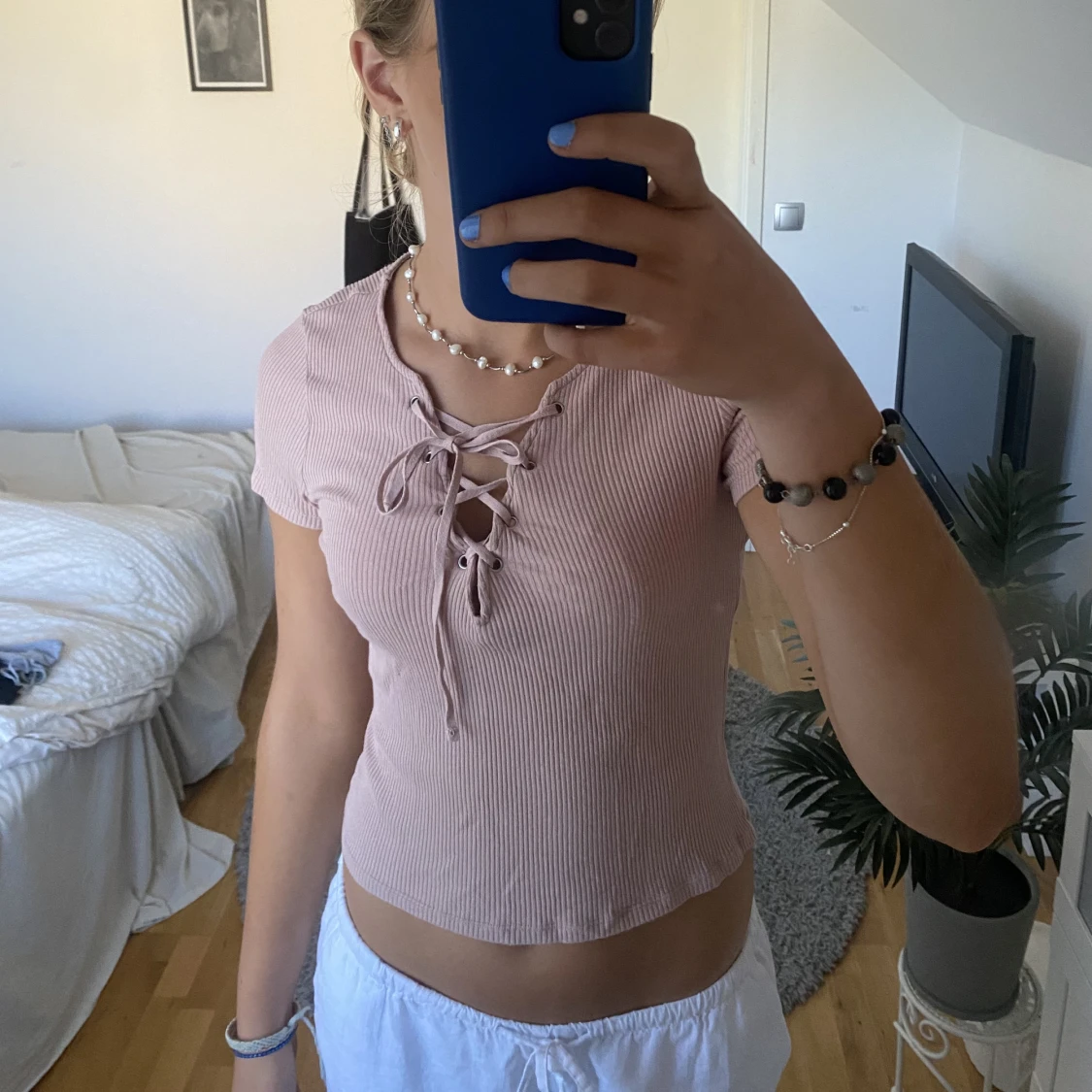 Rosa tröja med snören  - 91