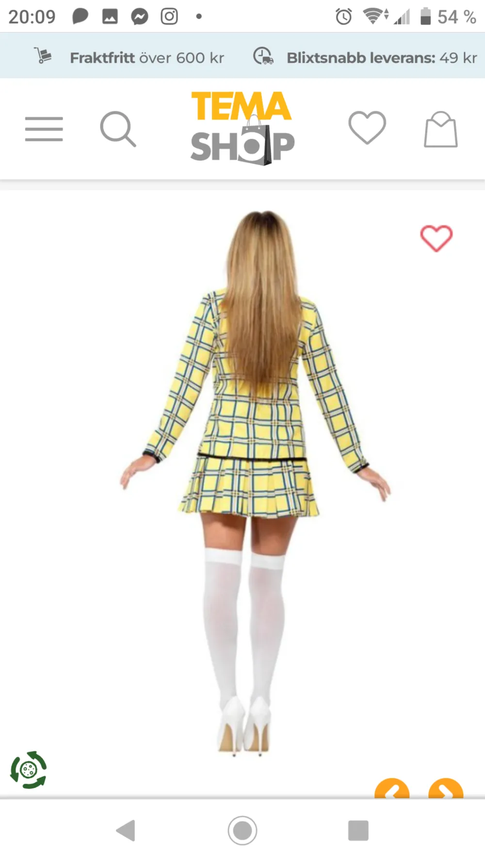 Klänning som ser ut som en kjol med gul top o matchande kavaj precis som Cher från filmen Clueless . Klänningar.