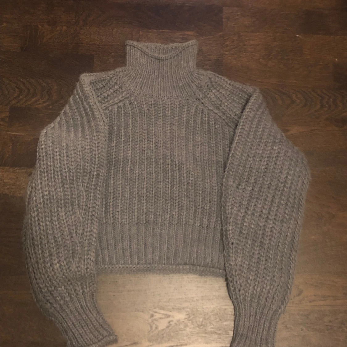 Croppad stickad tröja