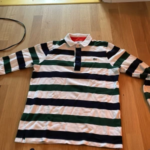 Lacoste  - En fin Lacoste piké tröja 