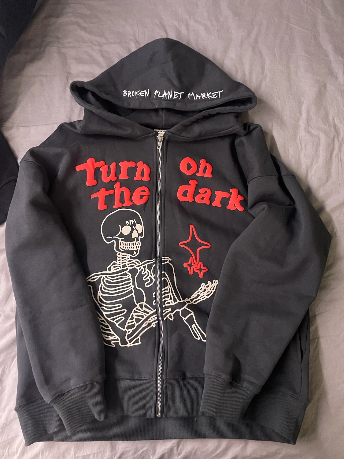 Broken planet market zip up