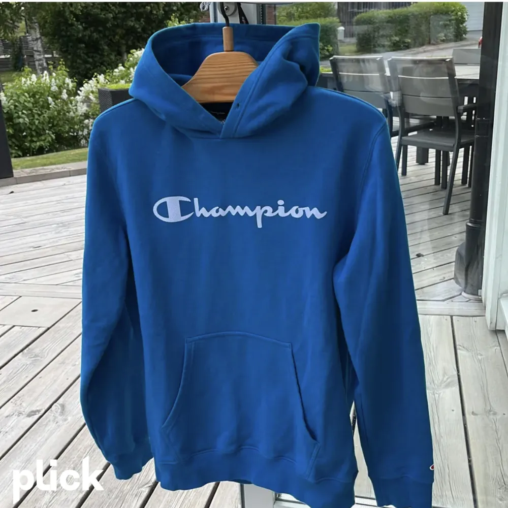 Snygg champion hoodie i storlek L. Hoodies.