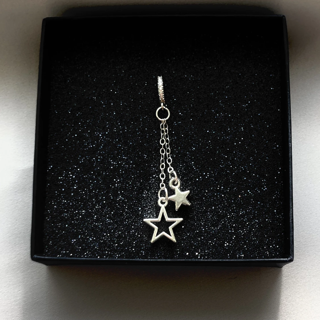 Dubbel stjärn-örhänge 