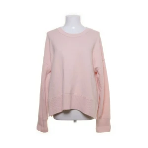 Rosa stickad tröja  - En stickad tröja som jag köpte på Sellpy 