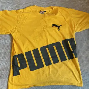En gul puma tshirt i gott skick, säljer pga att den inte används längre