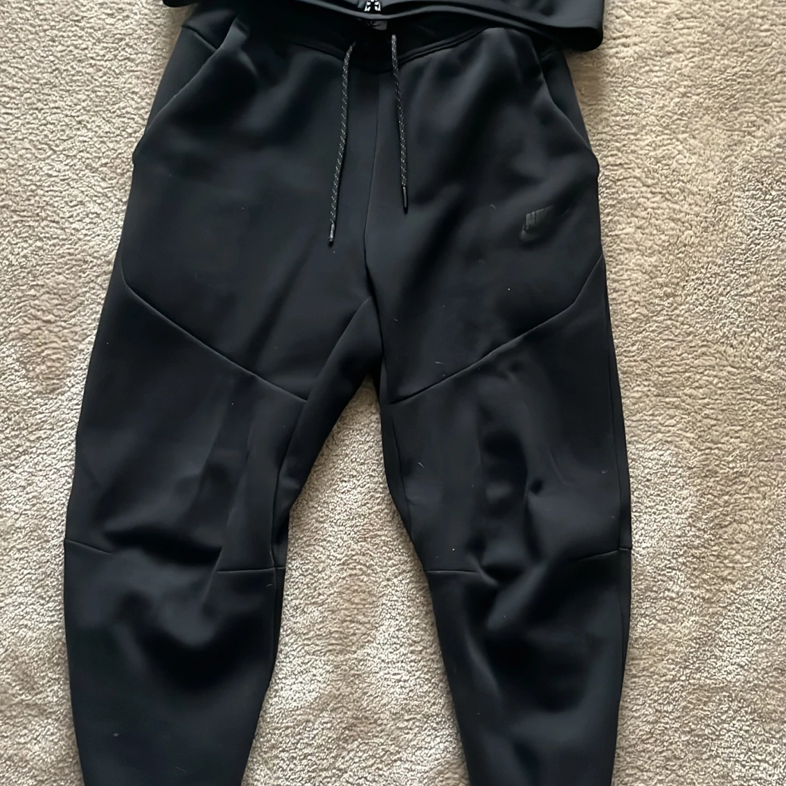 Svart Nike tech  - 90