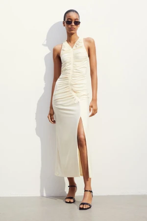 Beige klänning H&M - Beige klänning från H&M  Aldrig använd   Köptes för 499kr