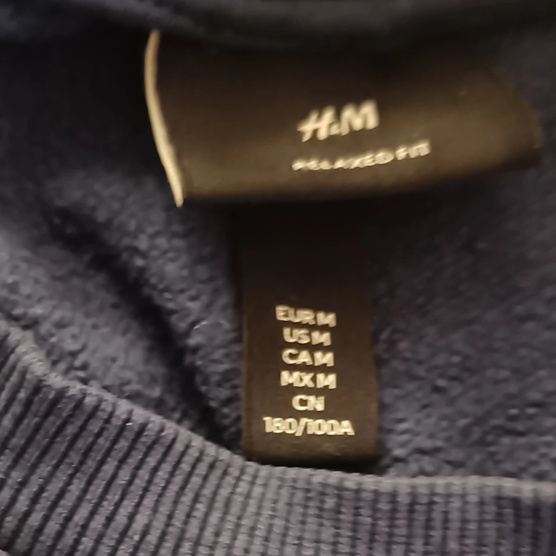 Blå tjocktröja  - 91