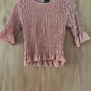 Ryschad topp - Orange ryschad tröja