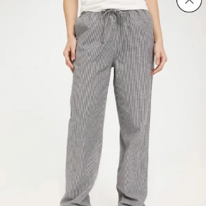 Randiga byxor - Storlek S