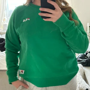 Grön Fila Tjocktröja - Grön tjocktröja från Fila Storlek M