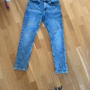 Blå Calvin Klein jeans storlek 14 år 164 cm