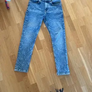 Blå Calvin Klein jeans storlek 14 år 164 cm