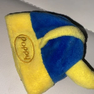 Poppy  mössa (för poppys) - Kan ha i bilen