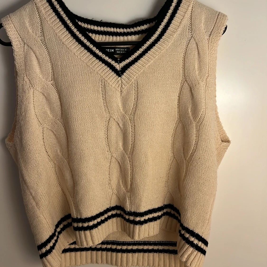 En stickad tröja  - 91