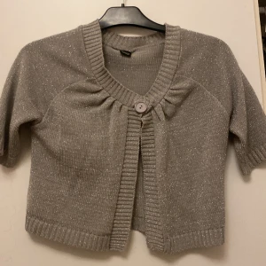 Glittrig kofta - Den fin och håller länge 