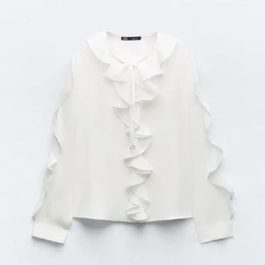 Zara volangblus - En vit oanvänd volangblus från zara i storlek S som inte kommer till användning.💞