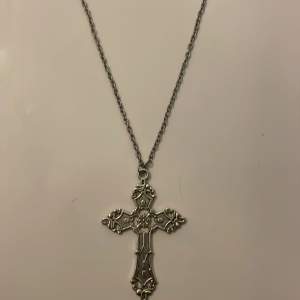  Necklace with a cross 