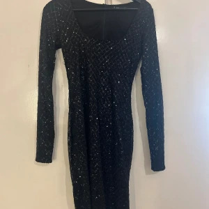 Glitter klänning  - Använt den som nyårsklänning 1 gång. 