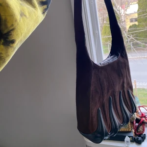 Leather future core bag Ecco Rare!! - Looks futuristic but it’s real vintage  Ecco bag, leather, brown and black detail Some cracks in the bottom but this bag is too cool and comfortable to wear to care  Love this bag but only wear black now so it’s got to go