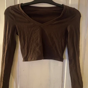 Topp  - Vet ej storleken men skulle tro att det är Xs, bra skick: