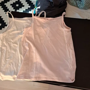 Linnen med rosett  - Gulliga linnen i storlek 128 men passar upp till 148 pga att de e super stretchiga