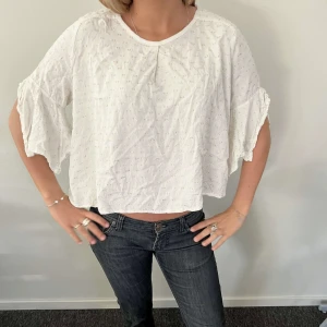 Topp  - En fin sommartopp som är lite liten i storleken skulle säga att den passar S/xs 