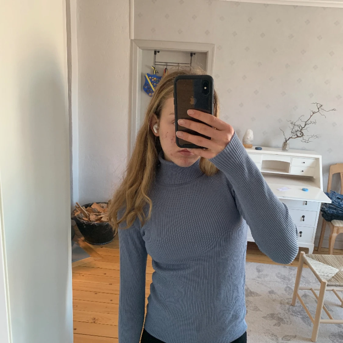 Fin blå stickad polotröja